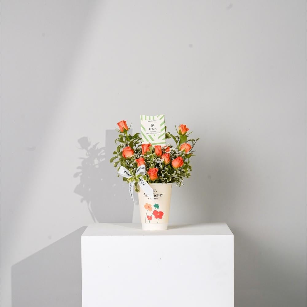 Orange cup with decoration